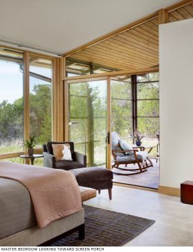 The master bedroom's patio doors can be opened wide to the screened sleeping porch. The concrete flooring acts as a thermal mass that retains heat at night and releases it during the day.