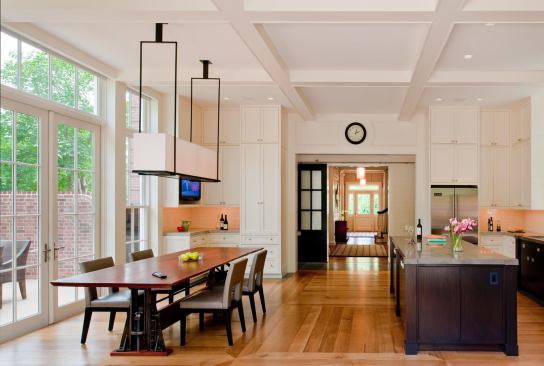 A new kitchen aligns itself on the main axis of the original historic house.