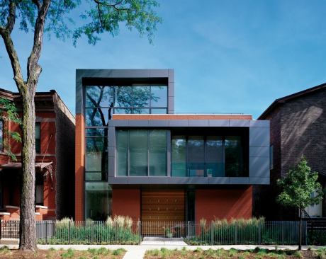 This modern infill residence relies on scale, massing, and the use of red brick to harmonize with its neighbors. Incorporating commercial-grade materials in both structure and finish, the project drew on Goldberg General Contracting's experience in both residential and commerical construction.