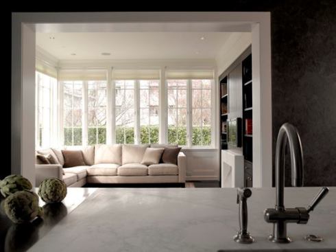 The goal was to replace a dark and camped kitchen with an expansive space that opens gracefully to a renovated family room (formerly the mudroom) and existing dining room and entry.