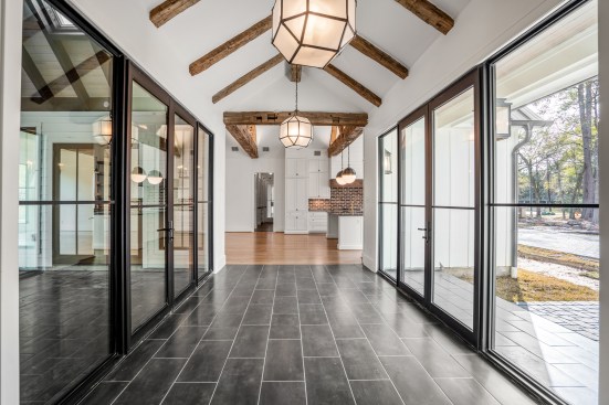 Double sided hallway with walls of windows 