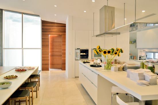 The house features an Italian-made kitchen with hard-wearing solid surface countertops.