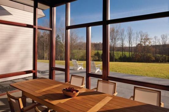 Geometric lines of wood millwork artfully combine windows into a wall of glass that lends expansive views and blurs the boundaries between indoors and out while still adding visual interest.


Project: Becherer House, Charlottesville, Va.; Architect: Robert M. Gurney, Washington, D.C.; Builder: Shelter Associates, Charlottesville, Va.