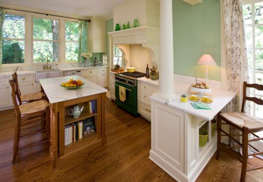 Seating located in a few different places marries family room functionality with a warm and casual vibe. Project: Conrad Poor Residence, Maplewood, N.J.; Architect: Clawson Architects; Builder: COTA Group
