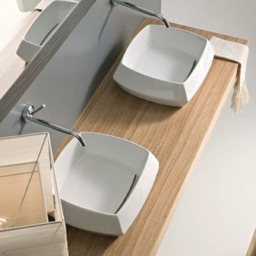 The Haslaa above-counter basin features a drain that’s there but not there. Imported from Italy, the piece is made with fireclay ceramic, which is heavier and yet smoother than standard ceramic. www.pscbath.com.