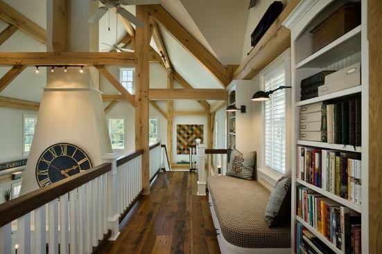 Track lighting and wires are mostly concealed by drilling through the timbers and snaking them out of sight. Track lights work well to illuminate large, open spaces, but they don’t go with traditional style, so the timbers helped hide them.