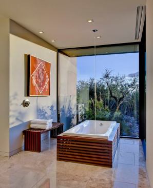 2013 Grand winner, Master Bath in a custom home: Pima Canyon Master Bath An ipe-clad bathtub and a wall-height glass window with garden views reinforces this master bath's connection to the outside.