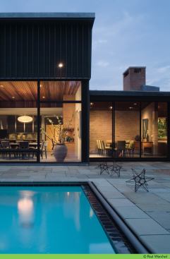 With the remodel of this 1950s ranch, the pool got updated environs, including a pebble garden and fire pit. Project: Residence 1255, Chicago area; Builder: Rizzolo Brothers Company, Inc., Libertyville, Ill.; Architect: Grunsfeld Shafer Architects, Evanston, Ill.