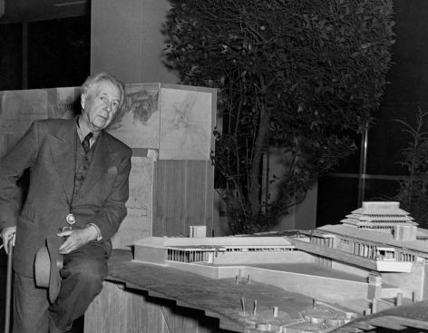 Frank Lloyd Wright with Wingspread Model at the Exhibition.