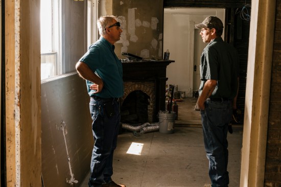 Dan Dulyea, left, is happy his son is clean and back to work at the family business in Martinsburg, W.Va.