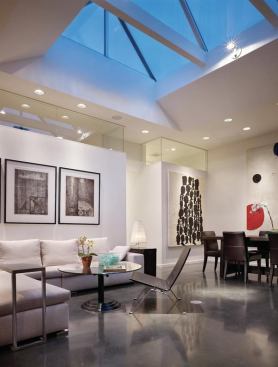 Wrapping clerestory windows add variety to this home's interior without disrupting the living space's all-white palette. Project: Madrona Live/Work, Seattle; Architect: Tyler Engle Architects, Seattle; Builder: Christensen Construction, Bellevue, Wash.