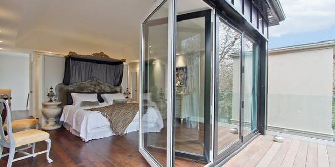 The company’s folding and bi-fold glass walls can be installed almost anywhere in a home in a variety of custom heights and widths. Some doors pass Florida hurricane ratings and are certified for both Florida State Impact and Miami Dade and can be specified with a variety of glazing options such as low-E, acid etched, frosted, and art glass. www.solarinnovations.com.
