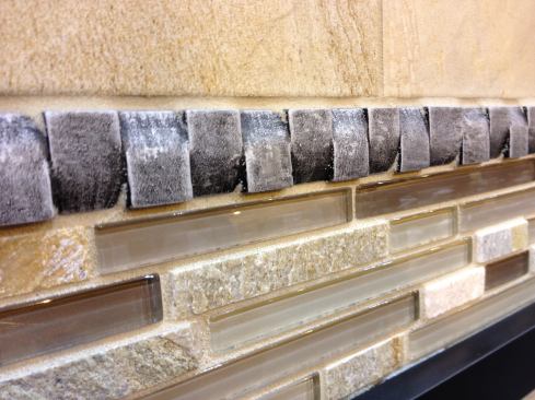 Florida Tile. The PietraArt Bliss line fuses stone and glass, blending travertine, granite, and marble with glass colors in two mosaic sizes. More 
here.&nbsp;