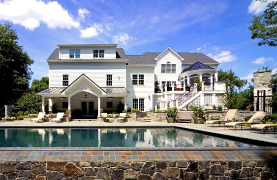 This outdoor living space by Sun Design in McLean, Va., has multiple levels that draw visitors to different entertaining areas. www.sundesigninc.com