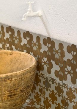 Spanish designer Patricia Urquiola used her love of pattern (and cement) for the new Azulej collection for Mutina. Inspired by ancient handcrafted majolica made of hydraulic cement, the 8-inch-by-8-inch glazed porcelain tiles are available in three neutral base colors in nine patterns or as a patchwork composition of 27 different designs. The tiles can be used on floors and walls, both indoors and out. www.mutina.it.