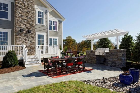 An outdoor living space accompanying a Beazer home at Willowsford.