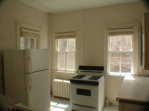 Before: The original kitchen was in the rear of the home's main level.   2011 Remodeling Design Awards (September)  Whole-House Remodeling $250,000 – $500,000  Kube Architecture, Washington, D.C.