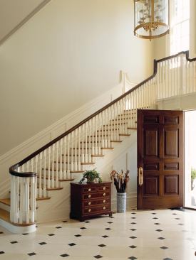 Piedmont Farm's entry hall features an elegantly curved staircase.