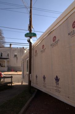 Tight Squeeze. A street sign doesn't yield or bend. These kinds of urban roadblocks are why setting modules requires far more preplanning than stick-built construction.