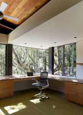 The main house’s study enjoys a contemplative forest view.