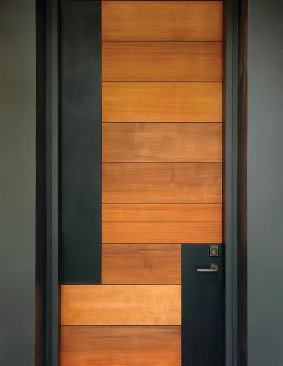 Staggered geometrical forms enliven the front door.