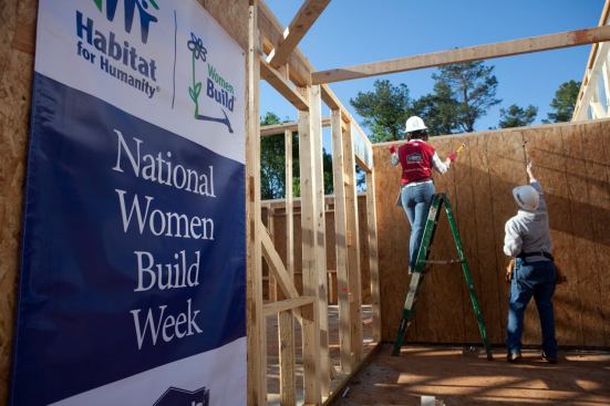 CHARLOTTE, NC -  Lowe's employee Lenora Stoner (left) and Bank of America employee Brenda Suits work on a wall during the Habitat for Humanity Women Build in Charlotte, NC on May 5, 2011.  Celebrity on-site building is actress Emily Bergl. (Photo by Jessica McGowan)