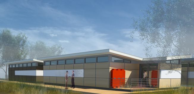 Butterfly roofs collect rainwater into water cisterns, while markerboard embedded in exterior cladding allows further opportunities for outdoor learning.