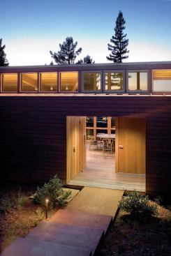 Clerestory windows on the entry side of the house assist with cross-ventilation.