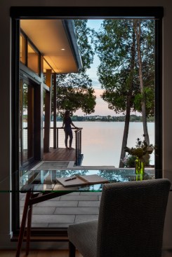 The design was inspired by styles often seen in a temperate climate including the clean lines, blended exterior/interior living spaces, and large glass walls, which lend themselves well to this lakeside site. The prominent location on the western lakeshore called for a transparent layout that frames focused lake views. 