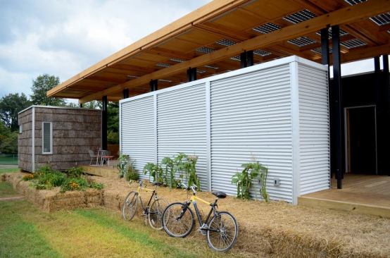 The Solar Homestead consists of six outbuilding modules that connect to form the Great Porch.