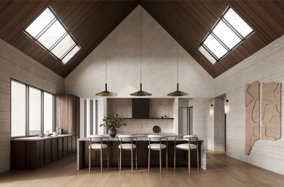 The sumptuous kitchen underscores the raw materials and textures wielded throughout the home. A granite island grounds the space with Arteriors barstools for four. Brass pendants illuminate the double height kitchen with the addition of two skylights built into the pitched ceiling. Straight-stacked tile not only acts as a backdrop for a sizeable cook and prep area , but also provides another layer of texture against the hand troweled plaster walls. Counter height cabinetry affords storage without obscuring views through sweeping windows and the free-flowing open concept. 