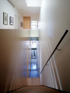 ...while a linear stair hall handles all circulation.