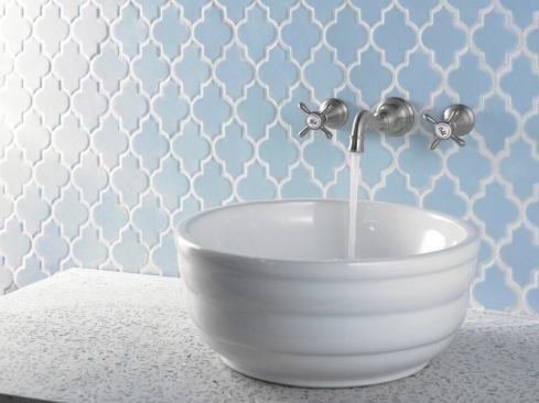 The new Weymouth bath collection from Moen is decidedly traditional but with clean lines. Pieces feature elaborate details such as porcelain inlays with decorative “Hot” and “Cold” script in English or French. A variety of design options are available. 
www.moen.com.