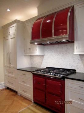 This company specializes in stock and custom hood ranges that can be ordered in almost any design you can imagine using copper, brass, sheet metal, and stainless, among others. Units also feature a membrane that senses static pressure and increase air flow accordingly. 
www.modernaire-hoods.com.