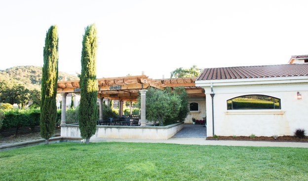 Photo by Dan Quinones, The redwood pergolas encourage guests to enjoy the spectacular beauty of the property.