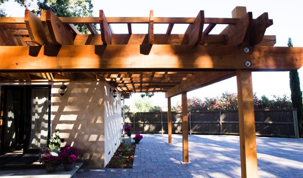 Photo by Dan Quinones, A smaller redwood pergola shades the entryway to one guest casita on the property. The winery can host up to 45 guests overnight.