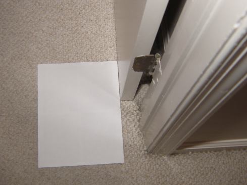 The existing opening left barely room on the hinge side of the door for a narrow strip of trim.