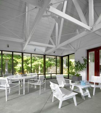 A screened porch is a necessity in buggy seasons, and keeps idle hands out of the way during dinner prep. 
Project:
Harbert Cottage, Harbert, Mich.; 
Architect: Searl Lamaster Howe Architects; 
Builder: Estowski Construction