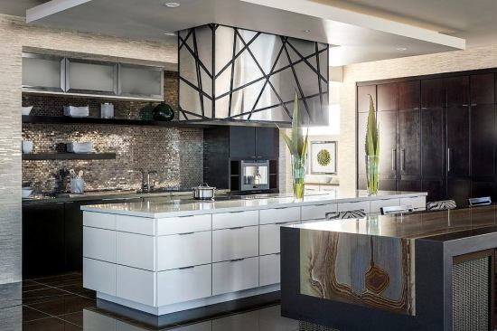 The kitchen features standard-sized Timberlake cabinetry, DuPont Zodiaq quartz surfacing, Thermador appliances, and two large islands--one for cooking and the other for entertaining, casual dining, or homework.