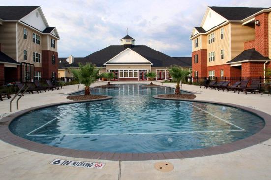 Taking the Plunge A large pool is the centerpiece of Campus Crest Communities' student housing bulidings in San Marcos, Texas.