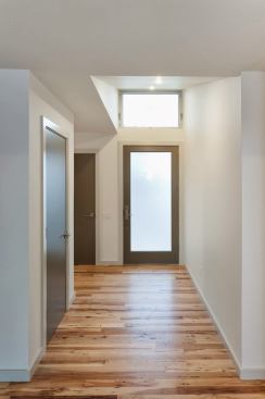 Notice the white base landing on the floor with no shoe moldings.