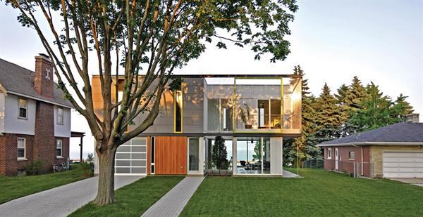 “Removing” a chunk of this new lakefront house’s rectilinear volume opened an outdoor room at the second floor.   2011 rada  OS House, Racine, Wis.  Merit Award/Custom Home 3,000 Square Feet or Less  Johnsen Schmaling Architects, Milwaukee
