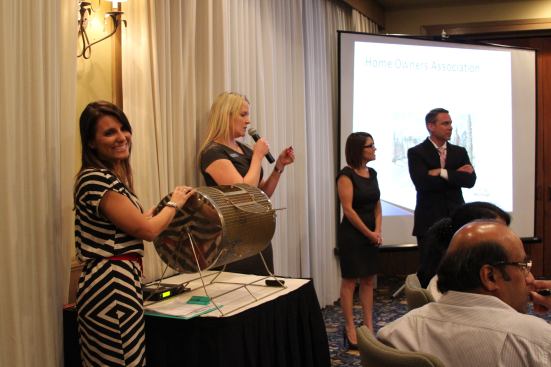 A Meritage employee drew 36 tickets from 100 hopeful buyers of lots in Parkside, a new higher-end Meritage Community in the Dr. Phillips area of Orlando.