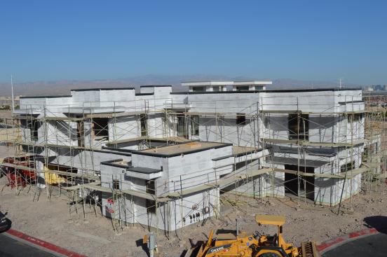 The structure is encased in Tyvek housewrap just before rainy weather sets in.