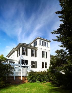 The house was falling down, but the owners didn't want to demolish it. What's more, the lot was too small to support a bigger house under current zoning--there was only a sliver of buildable land. Along with builder Gabriel Nasa, Moore was able to expand the house with a variance and the argument that this would allow for modest expansion and preservation.