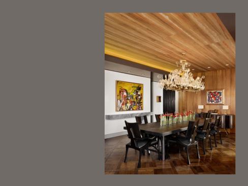 This dining room ceiling features wallpaperthat has been hand-painted to look like wood. The detail adds to a material richness found throughout the renovated apartment, including walnut-clad walls, red tiles, and leather, gold, and polished brass accents. 
Project:
Four Seasons Residence 29, Austin; 
A
rchitect: Webber + Studio, Architects, Austin; 
Builder: David Wilkes Builders, Austin.