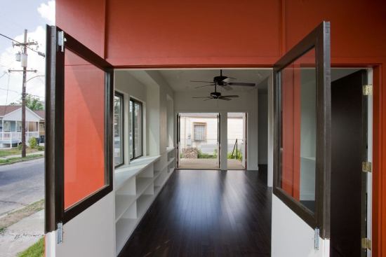 Laying out rooms based on standard building material dimensions saves money and waste. It also allows for custom details like these window seat bookshelves to be added for very little effort or expense.