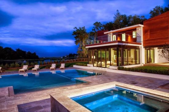 1st Place People's Choice Winner

The 2013 Doug Lebda Guest House, aka On Water, Wilmington NC, designed by Michael Ross Kersting with Toby R. Keeton of Michael Ross Kersting Architecture of Wilmington.  Built by Mark Batson, Tongue and Groove Custom Builder. Rudy Dombroski, structural engineer.