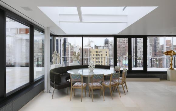 A large skylight defines the dining area.