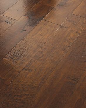 Shaw Floor 
s &nbsp;Engineered hardwood is made with three to five layers of hardwood stacked in a cross-grain configuration and bonded together under high heat and pressure. It offers more durability compared with solid hardwood, says manufacturers, and is less likely to be affected by humidity and moisture. The Acadian line uses Shaw’s environmentally friendly EnviroCore, made of recycled wood fiber. 
Prices start at $8 per square foot.&nbsp;